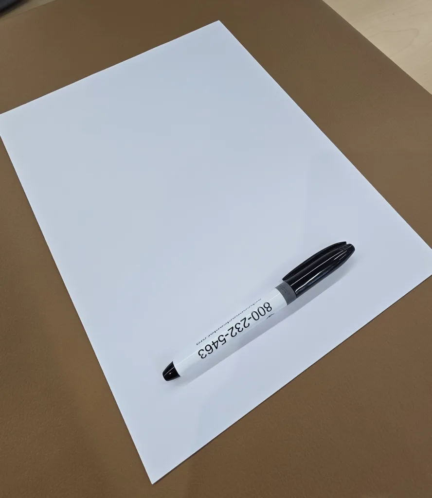 Plain piece of paper and pen