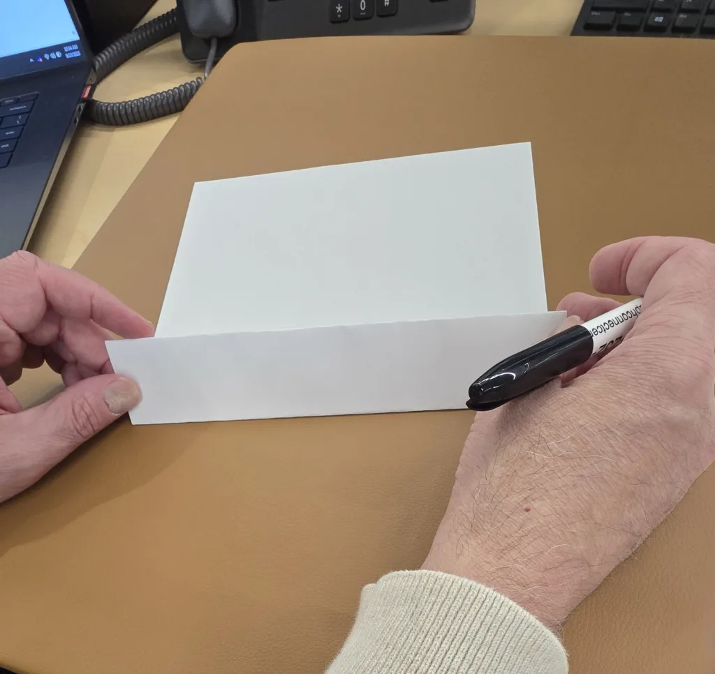 White piece of paper folding bottom line 1 inch for writing line.
