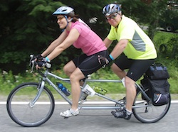 Scott Anderson Biking with a friend