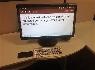 Text projected onto a monitor from an Android smartphone. 
On the screen: “This is the text editor on my smartphone 
projected onto a large screen using Chromecast.”