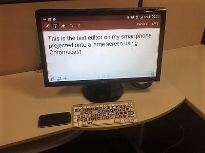 Text projected onto a monitor from an Android smartphone.
On the screen: “This is the text editor on my smartphone
projected onto a large screen using Chromecast.”
