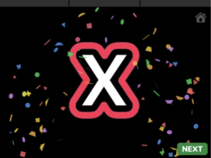Screenshot of the Bubbly app showing the enlarged letter and confetti that appears after you drag the correct letter into the bubble. 