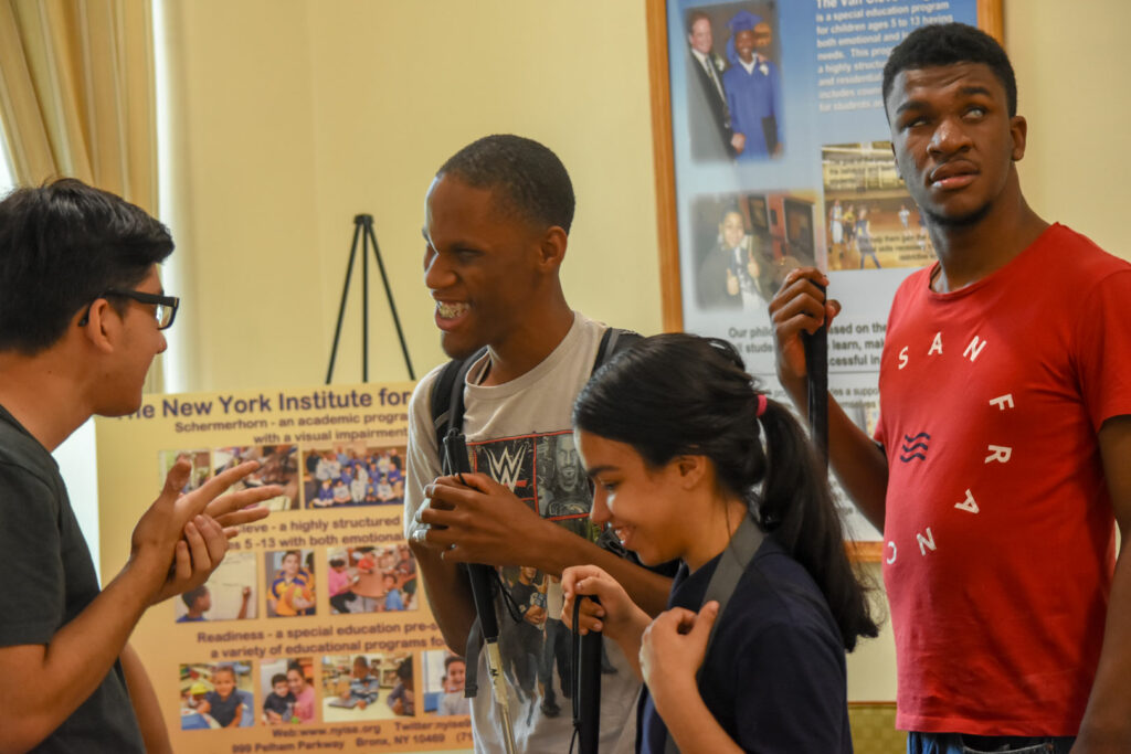A group of teens talking.