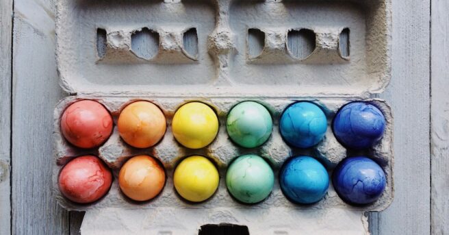 A carton of colorful eggs.
