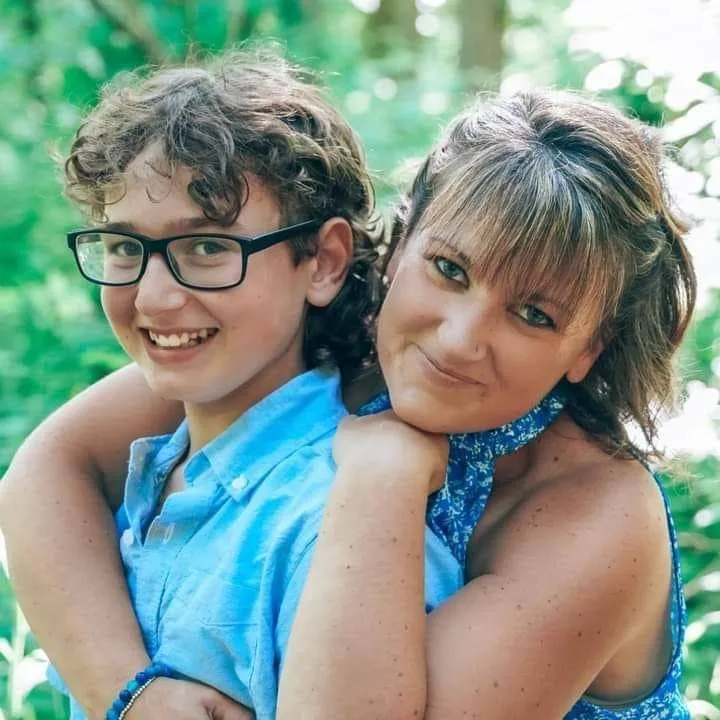 Parent and child embrace