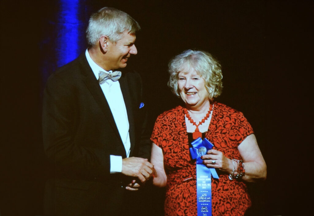 Lynda Lambert receiving an award