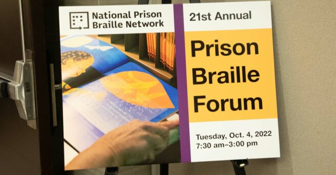 Poster with 21st Annual Prison Braille Forum and image of book with braille sticker placed outside an open door.