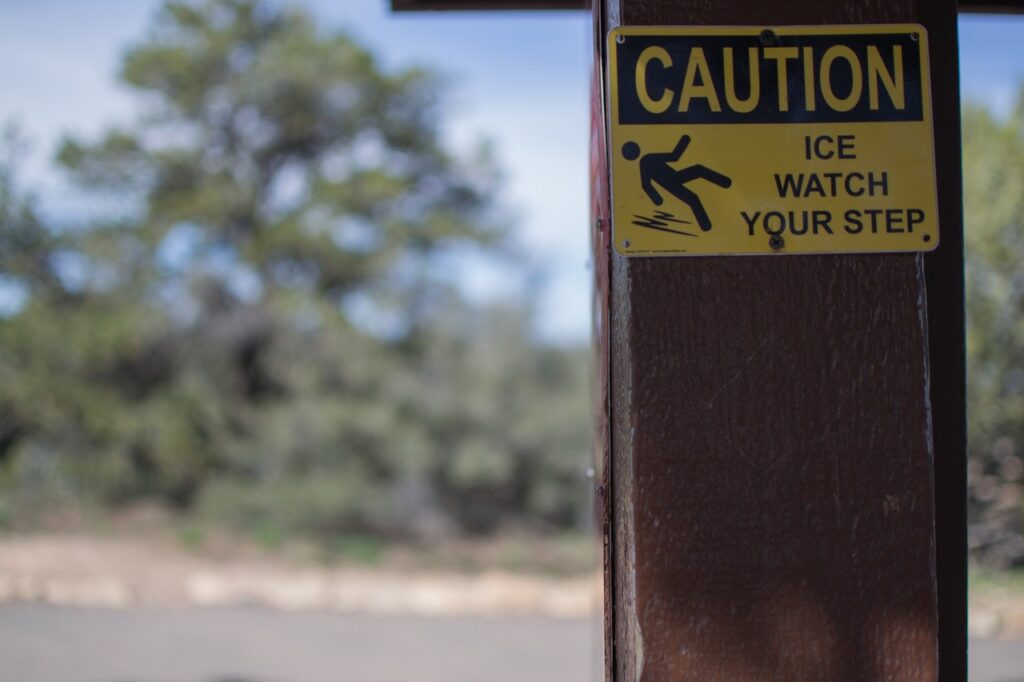 sign reading “Caution: Ice: Watch Your Step”