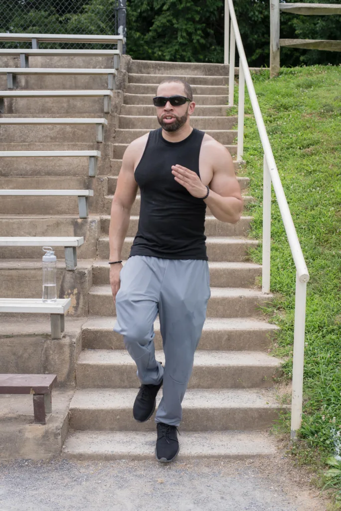 Man running downstairs outside. Photo courtesy National Eye Institute Media Library