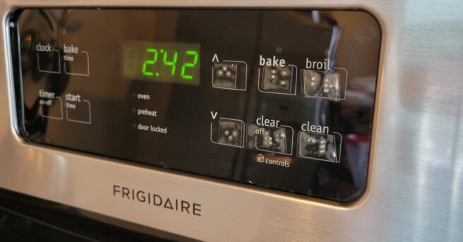 Display of an oven with braille labels added to buttons.