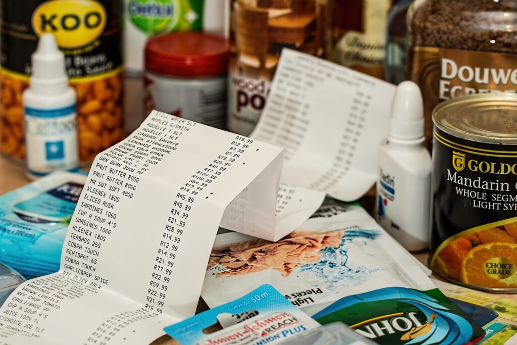 Receipt atop grocery items