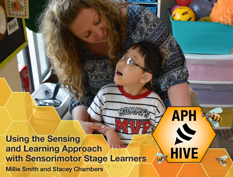 A woman with curly blonde hair is leaning over and assisting a young boy wearing glasses and a striped shirt that says "Mommy's MVP." They are in a colorful learning environment with various toys and books in the background. The text on the image reads "Using the Sensing and Learning Approach with Sensorimotor Stage Learners" by Millie Smith and Stacey Chambers. There is also a logo for "APH Hive" featuring a honeycomb pattern and a bee icon.