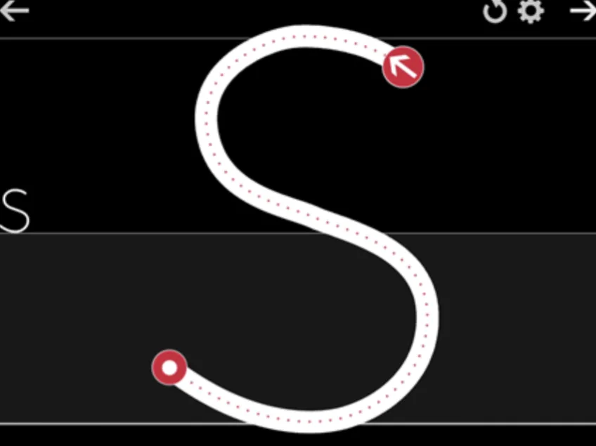 screenshot of writing the capital letter “S” on the Writing Wizard app. It is customized to have a black background.
