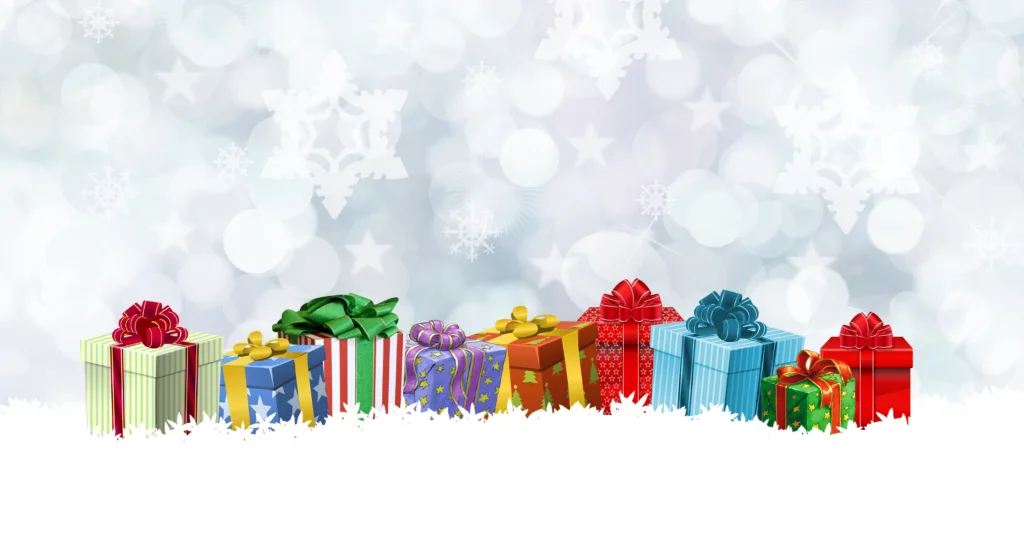 A row of colorful wrapped holiday presents with bows sits on a snowy white surface, with a soft background of snowflakes