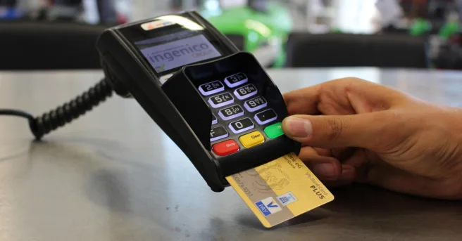 credit card inserted into a portable payment terminal