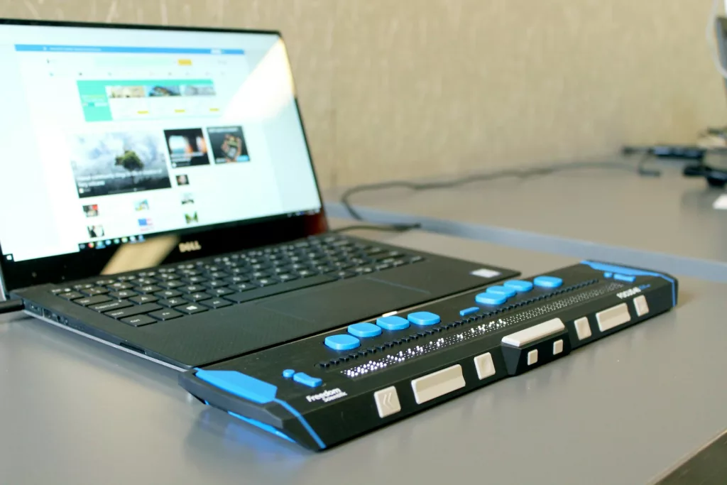 laptop with a refreshable braille display