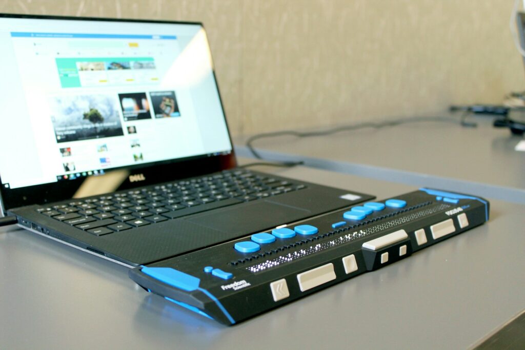 laptop with a refreshable braille display