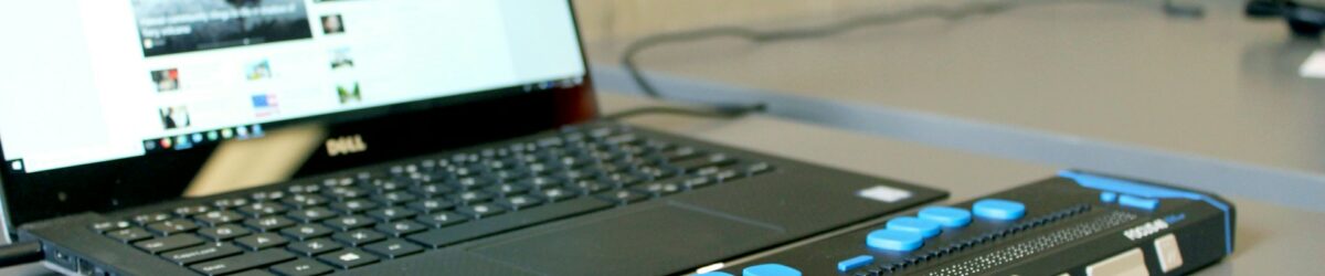 laptop with a refreshable braille display