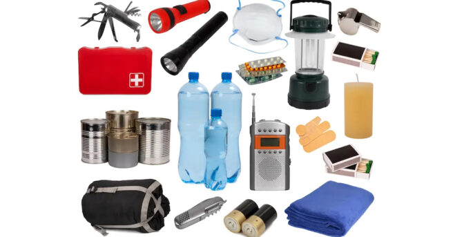 A collection of emergency preparedness supplies including bottled water, canned food, flashlights, a lantern, a first aid kit, a radio, batteries, a sleeping bag, a blanket, candles, matches, a multi-tool, face masks, bandages, and a whistle.