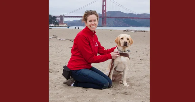 Jane with her dog Pilaf in Chrissy Field in front of the Golden Gate Bridge.