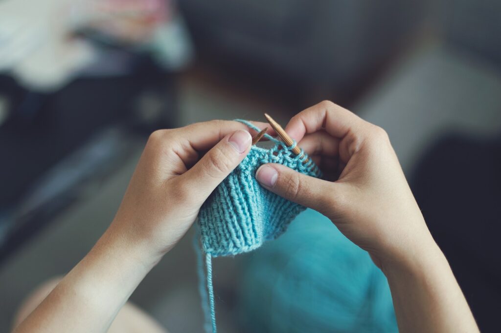 Two hands knitting