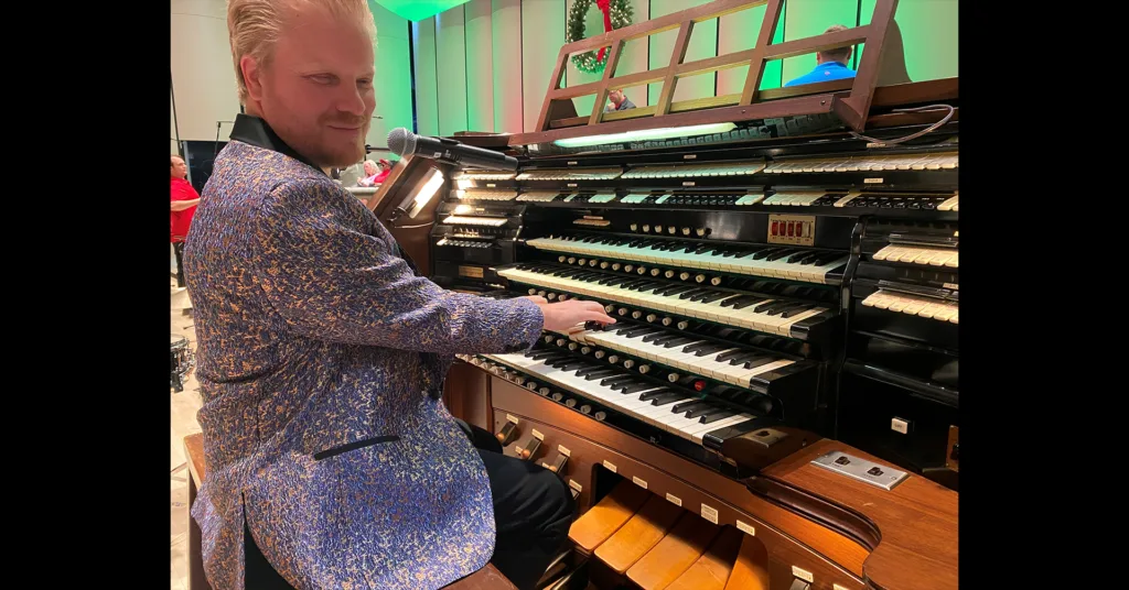 Jason playing an electronic organ