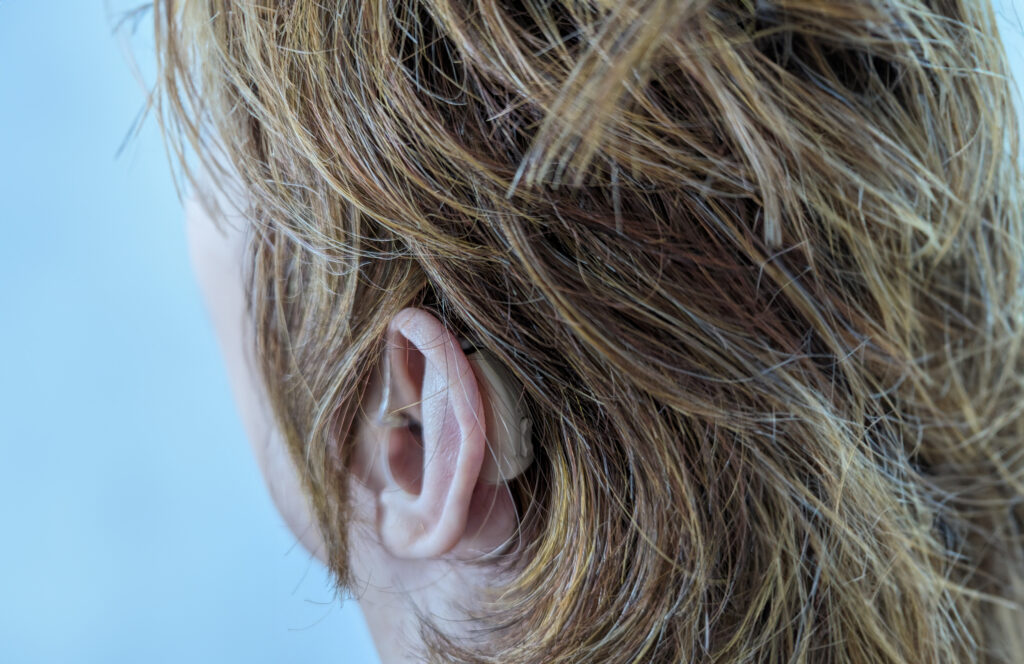 closeup of hearing aid in ear