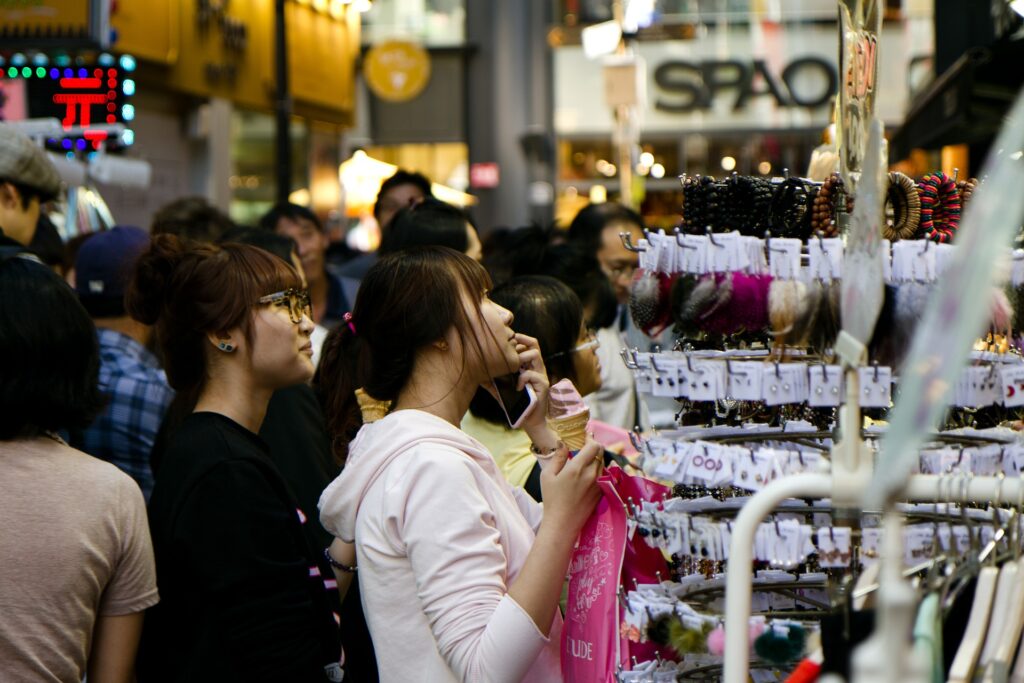 People gathered at a busy mall