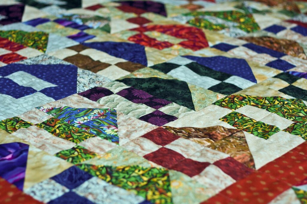 Quilt made up of many colors and fabrics