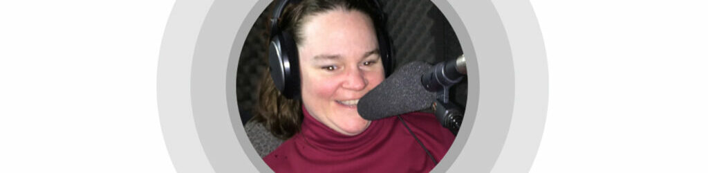 Headshot of Satauna Howery with a microphone in front of her.
