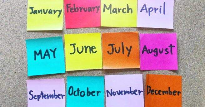 Post it notes in various colors with months of the year on it.