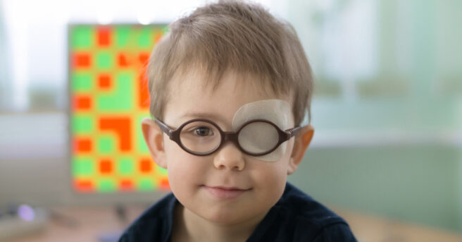 A little boy with an occluder undergoes a hardware vision treatment.