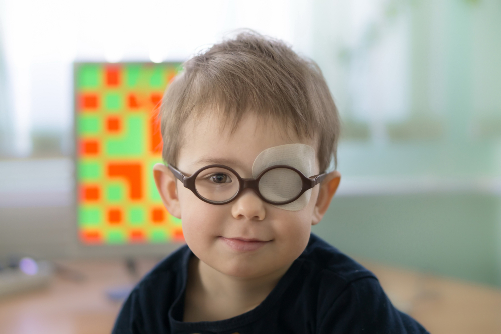 A little boy with an occluder undergoes a hardware vision treatment.