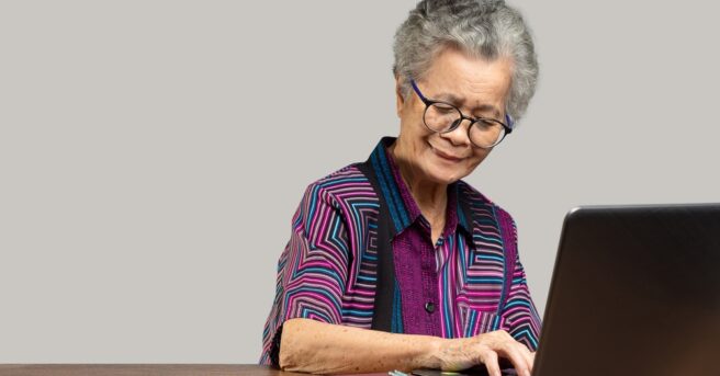 Older person using a laptop