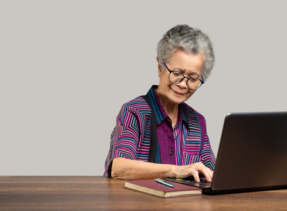Older person using a laptop