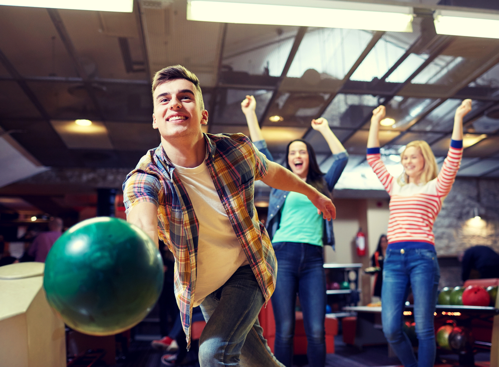 Person releasing bowling ball