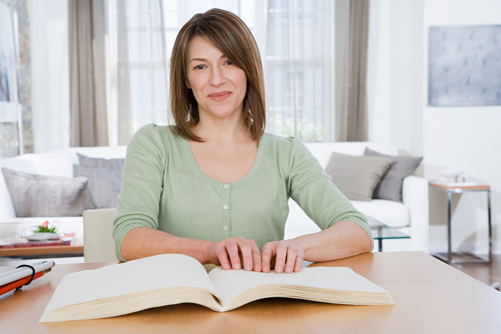 Person reading braille