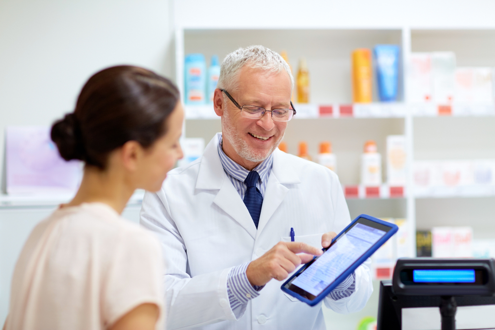 Person talking to a pharmacist