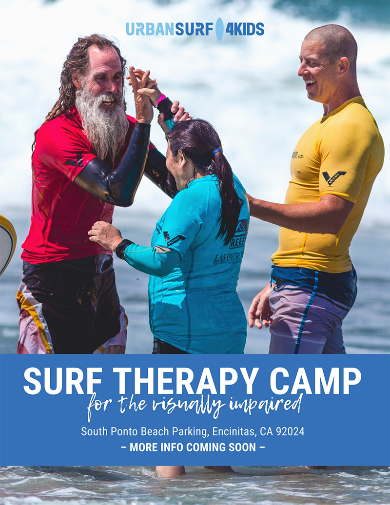 2 surfers are helping a young girl surf. Surf Therapy Camp for the Visually Impaired