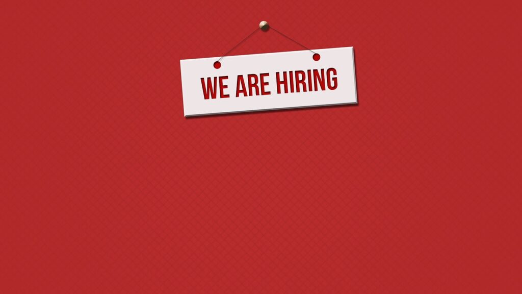Red background with text: "We are hiring"