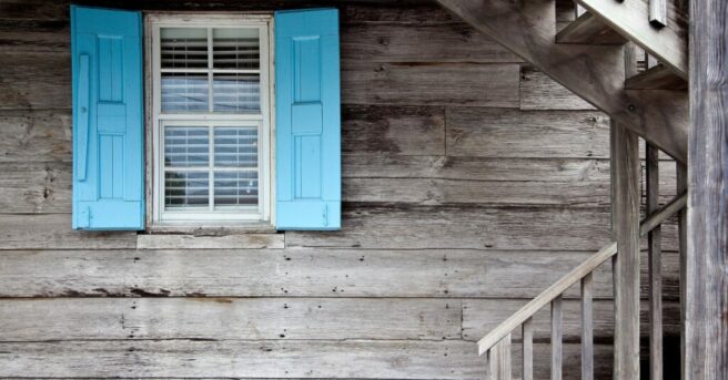 Window with blue shutters